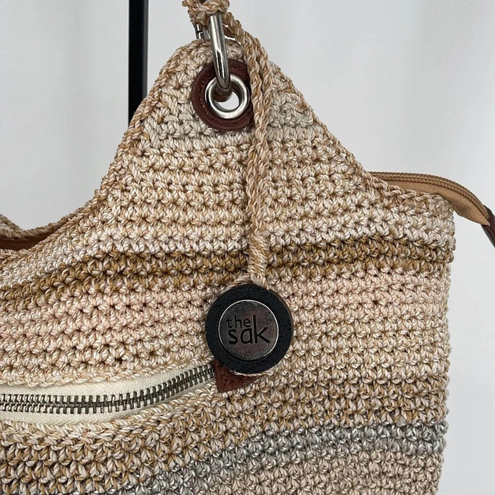 The Sak Woven Straw Hobo in Beige, Tan, Brown